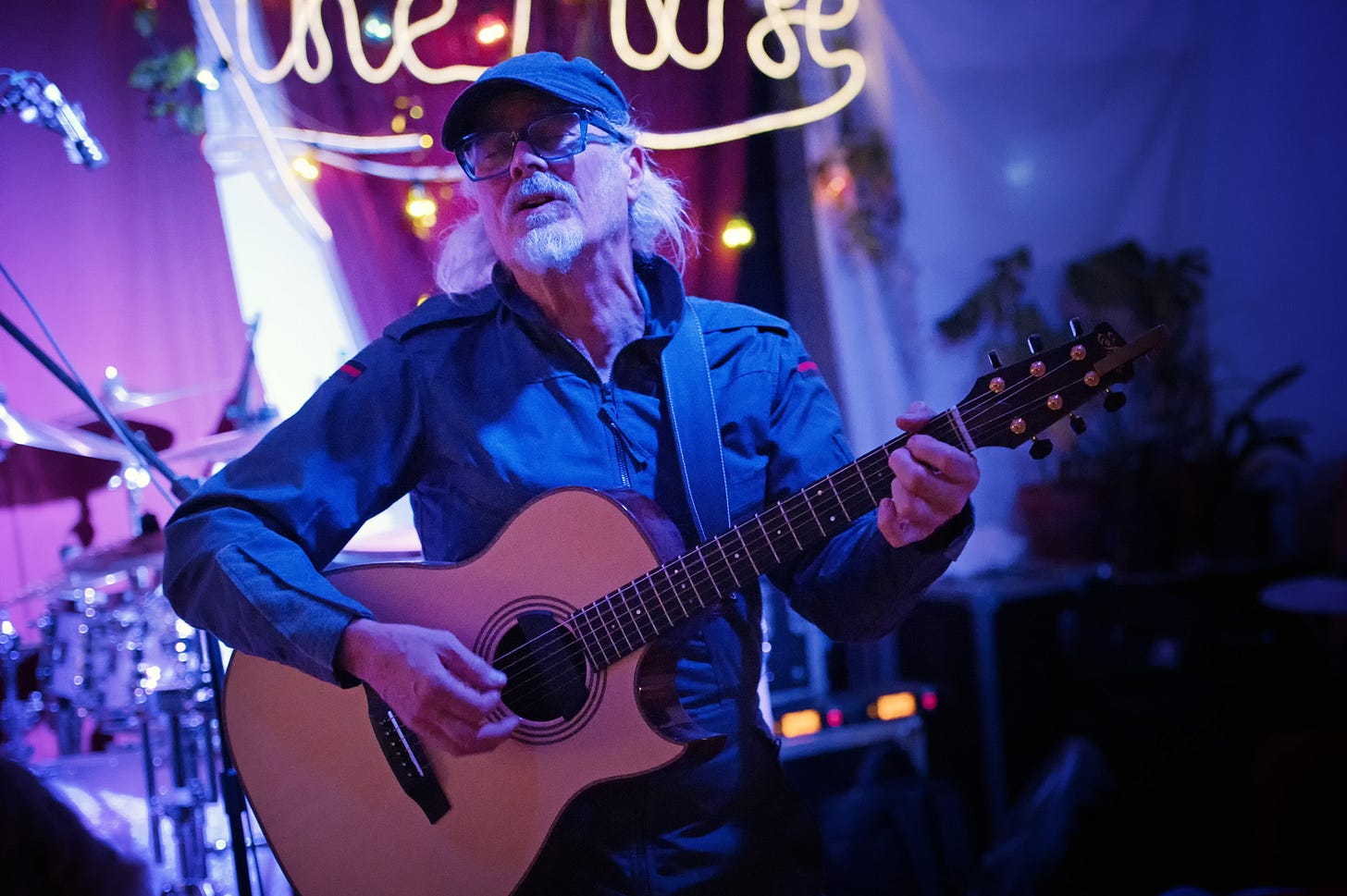 Man playing acoustic guitar