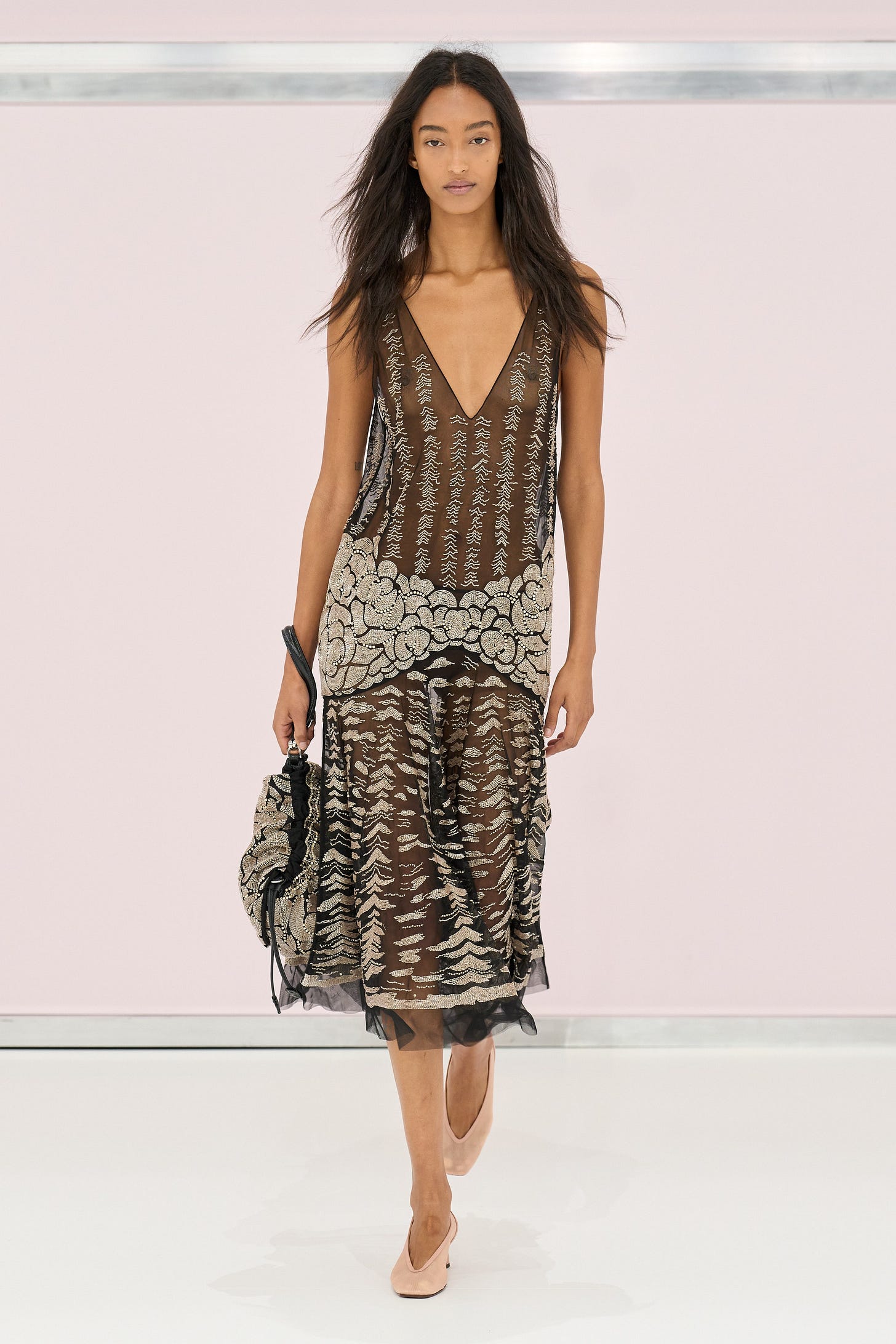 Image may contain Clothing Dress Adult Person Evening Dress Formal Wear Fashion Footwear High Heel and Shoe