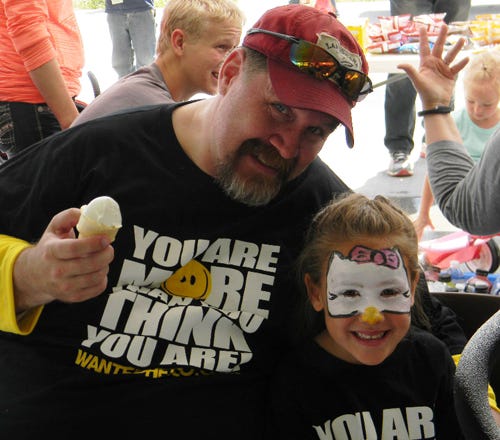 Jaime Buckley and his daughter wearing You are MORE than you THINK you are shirts