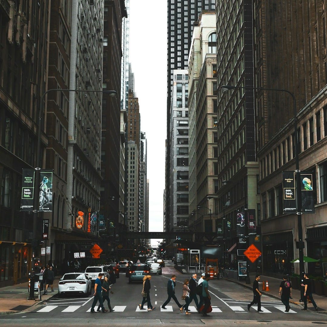 people crossing road during daytime people crossing road during daytime