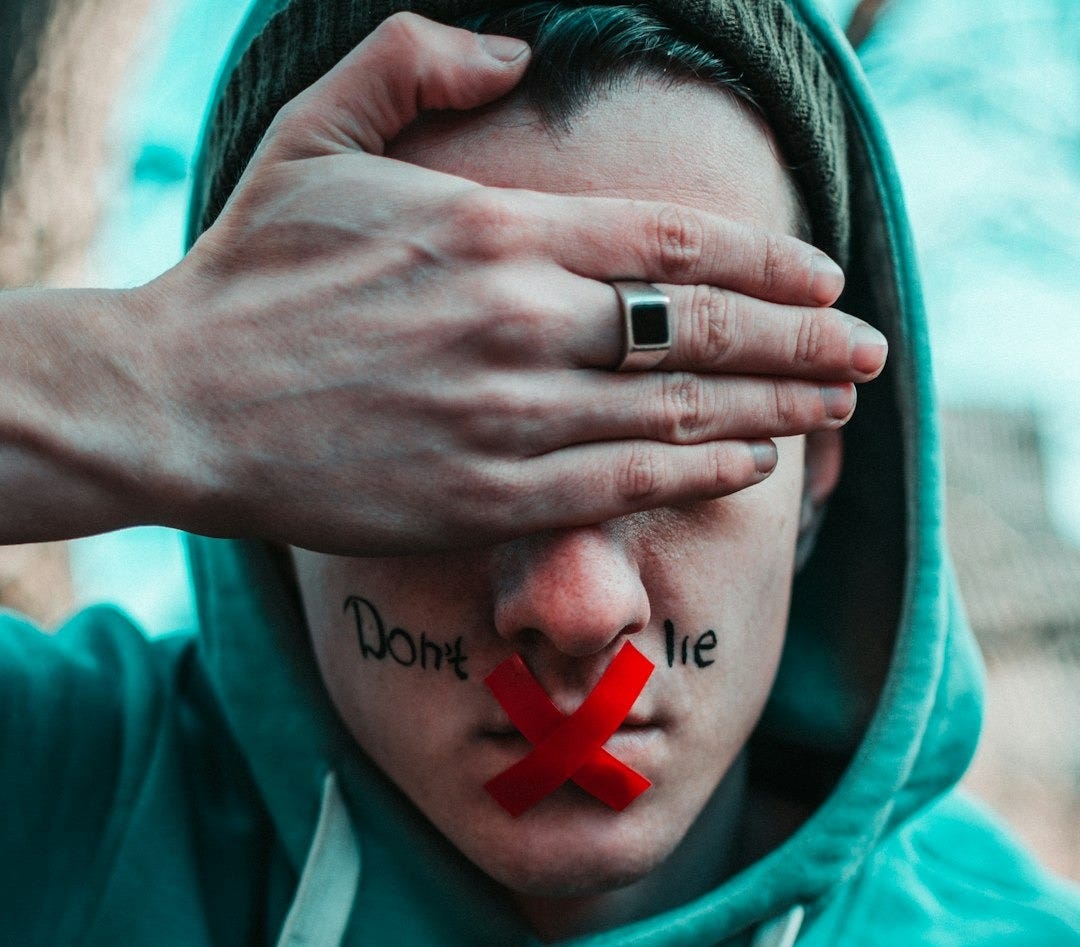 man in teal hoodie with i love you text man in teal hoodie with i love you text