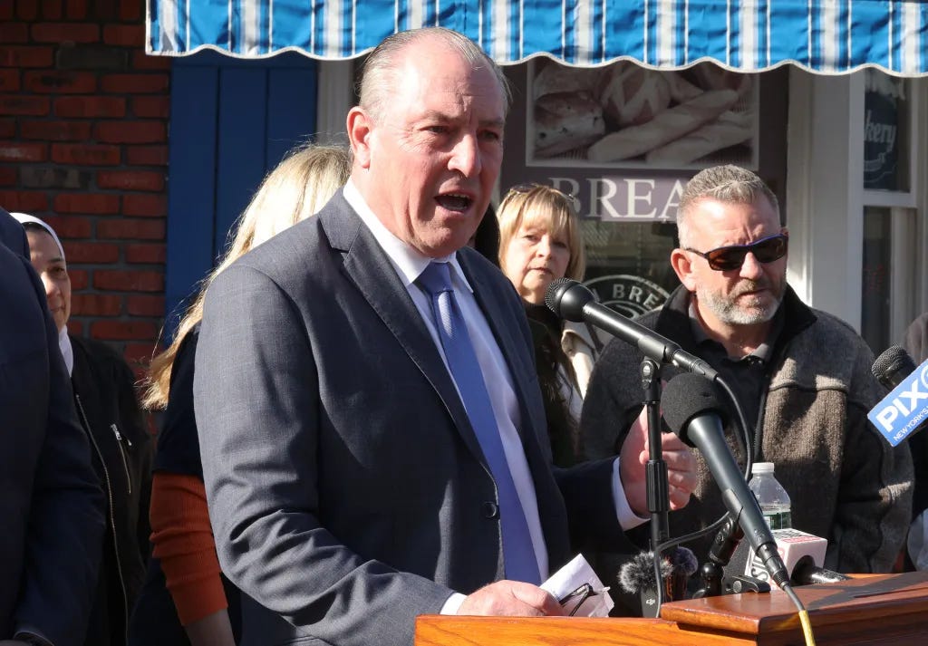 Vito Fossella, with Michael Reily in the background.