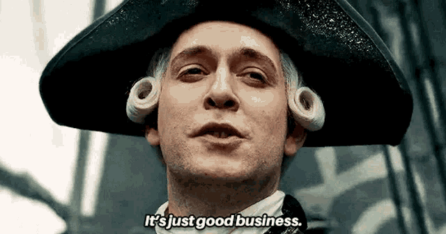 a man in a hat and wig is saying it 's just good business . a man in a hat and wig is saying it 's just good business .