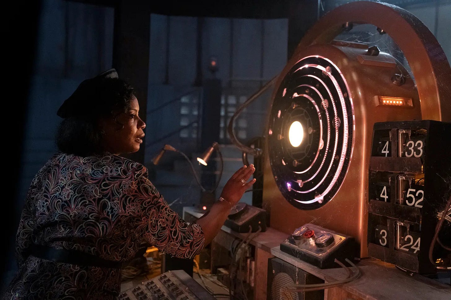 Hippolyta with her hand raised in front of a time machine Hippolyta with her hand raised in front of a time machine