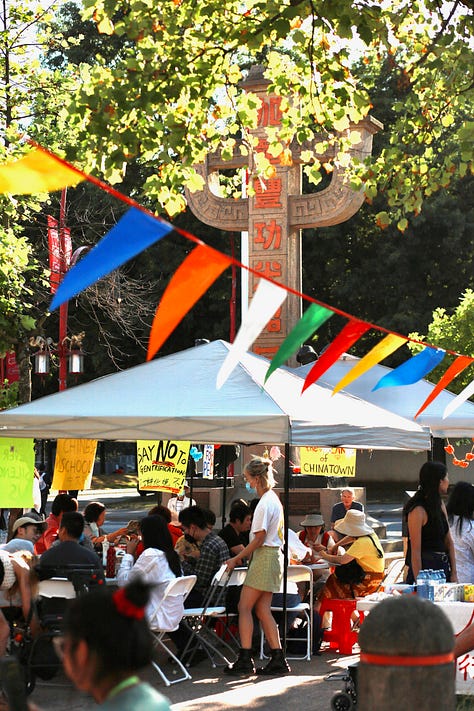People at the Chinatown Memorial Plaza