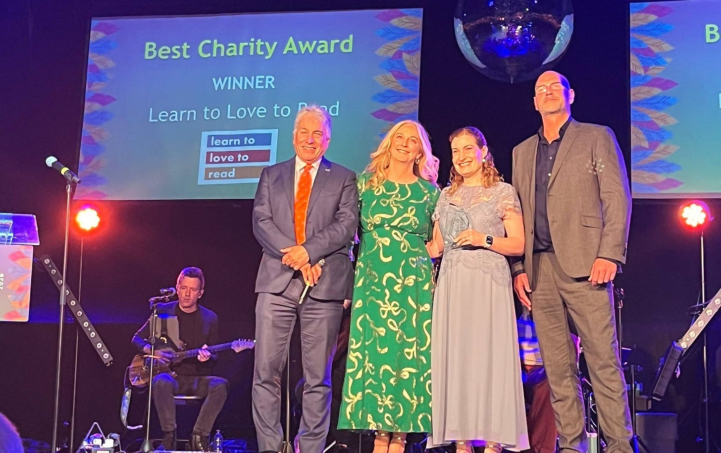 May be an image of text that says "Best Charity Award WINNER Learn to Love to d B learn to love to read"
