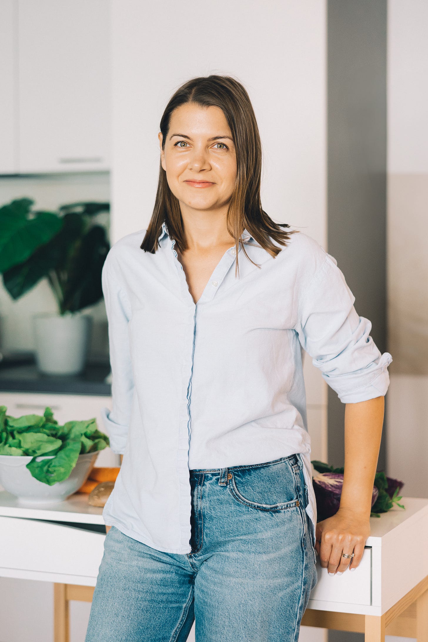 Image of Karina Baloleanu in the kitchen.