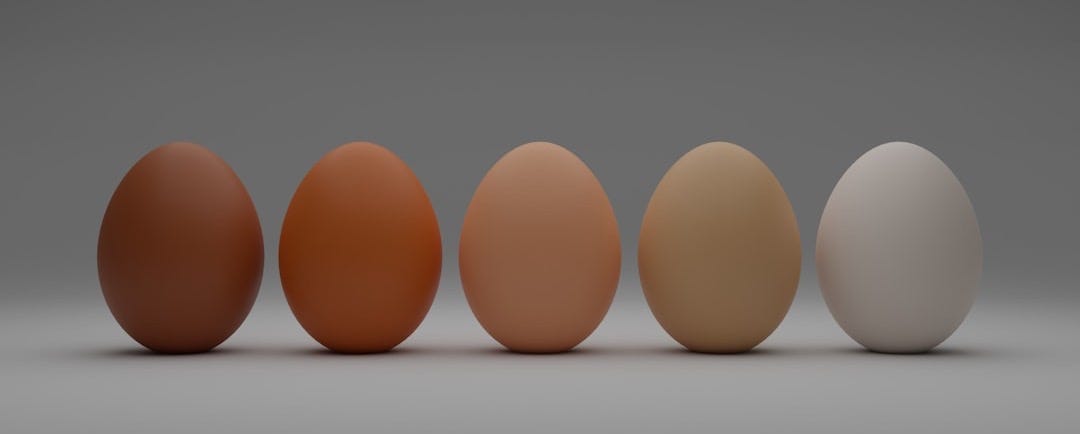 2 brown egg on white surface 2 brown egg on white surface