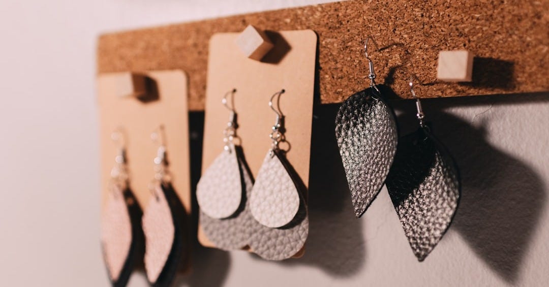 three pairs of silver hook earrings