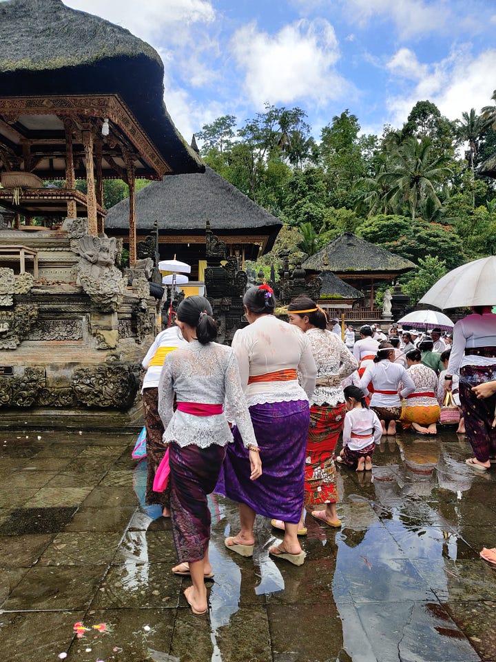 On the right are a group of women at the Pura Tirtha Empul in Bali, Indonesia. On the left, a durian seller stands with durians and a weighing scale inside her hut. Photos: Mahima Jain