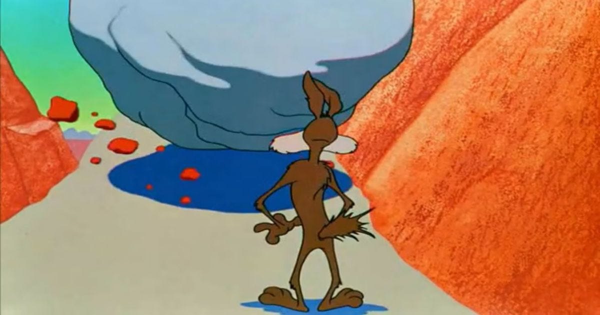 Wile E. Coyote, back to the audience, staring up at the enormous boulder about to roll downhill and flatten him.