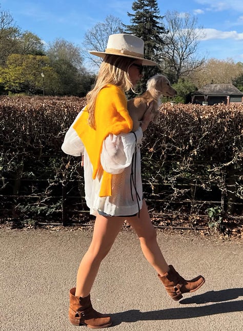 Collage of fall street-style trends: cherry-red jelly flats with white dress; white no-logo sneakers on NYC pavement; cropped boxy jacket; loafers with straight-leg jeans; motor buckle boots under flowy dress; classic beige trench coat.