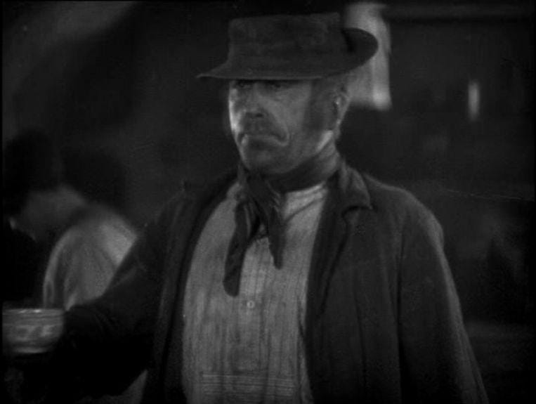 A person in a hat

Description automatically generated