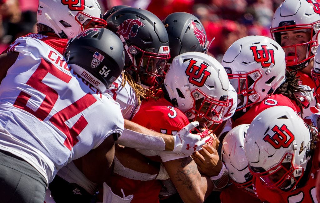 (Trent Nelson  |  The Salt Lake Tribune) Utah Utes quarterback Ja'Quinden Jackson (3) is stopped as the University of Utah hosts Washington State, NCAA football in Salt Lake City on Saturday, Sept. 25, 2021.