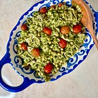 Pesto pasta salad with roasted colorful tomatoes