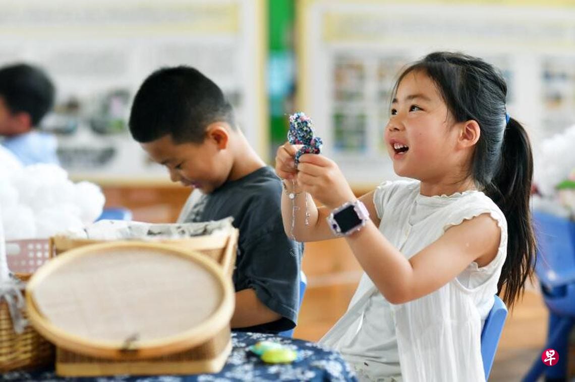 Joyful child making arts and crafts