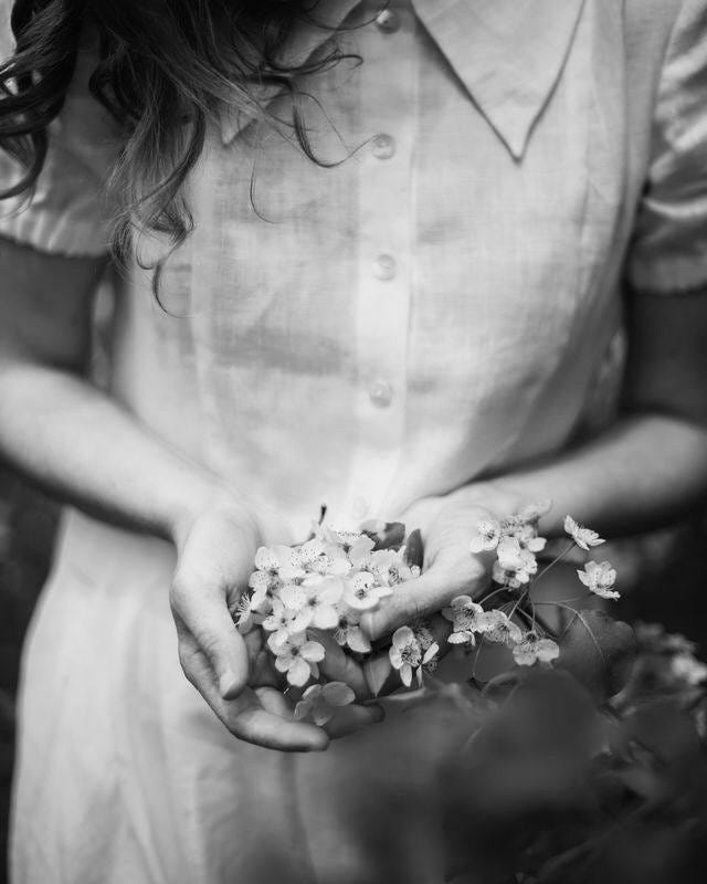 May be a black-and-white image of flower May be a black-and-white image of flower