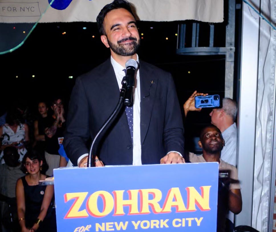 A person standing at a podium with a microphone
AI-generated content may be incorrect. A person standing at a podium with a microphone
AI-generated content may be incorrect.