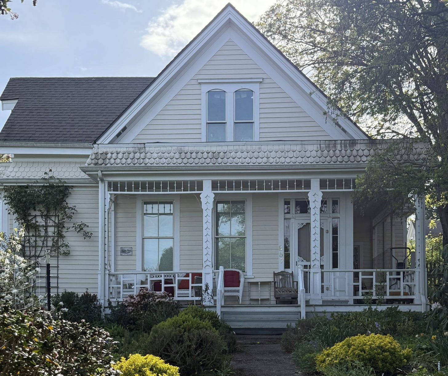 A 19th-centure Victorian home with wrap-around porch