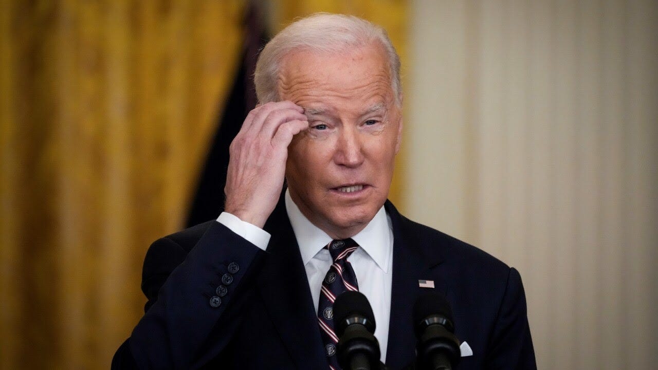 Biden stares blankly, picks at his teeth after he's asked if he  'underestimated' Putin
