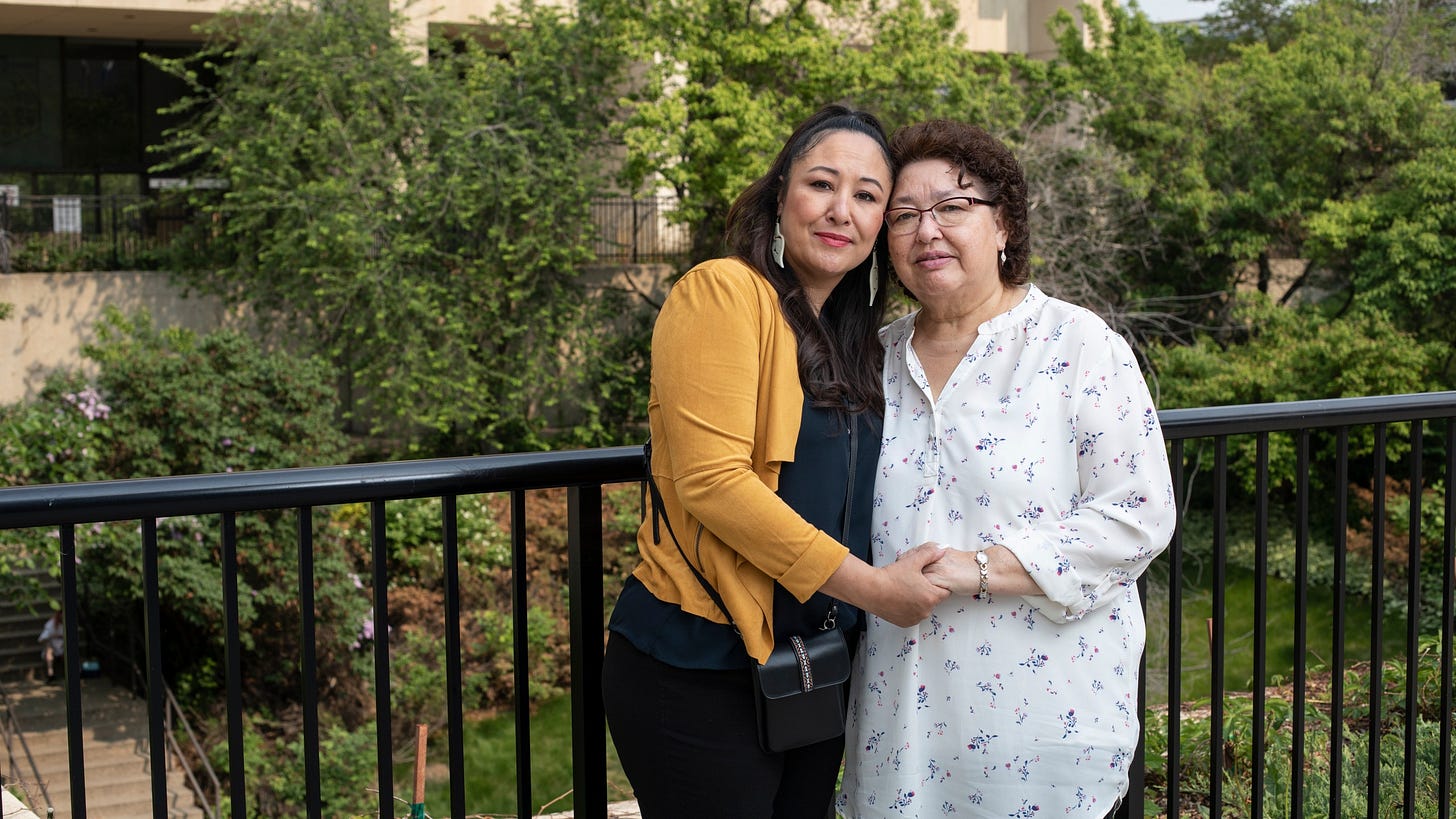 May Sarah Cardinal and her daughter, Anita Cardinal, stand for a portrait outside the Law Courts building in Edmonton, Alberta, Canada on Thursday, May 25, 2023. May Sarah only realized she had been forcibly sterilized when Anita pieced it together, after watching a video in a university class about eugenics and forced sterilization. (AP Photo/Amber Bracken)