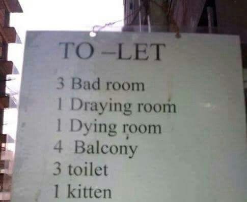 This may contain: a sign that is on the side of a building