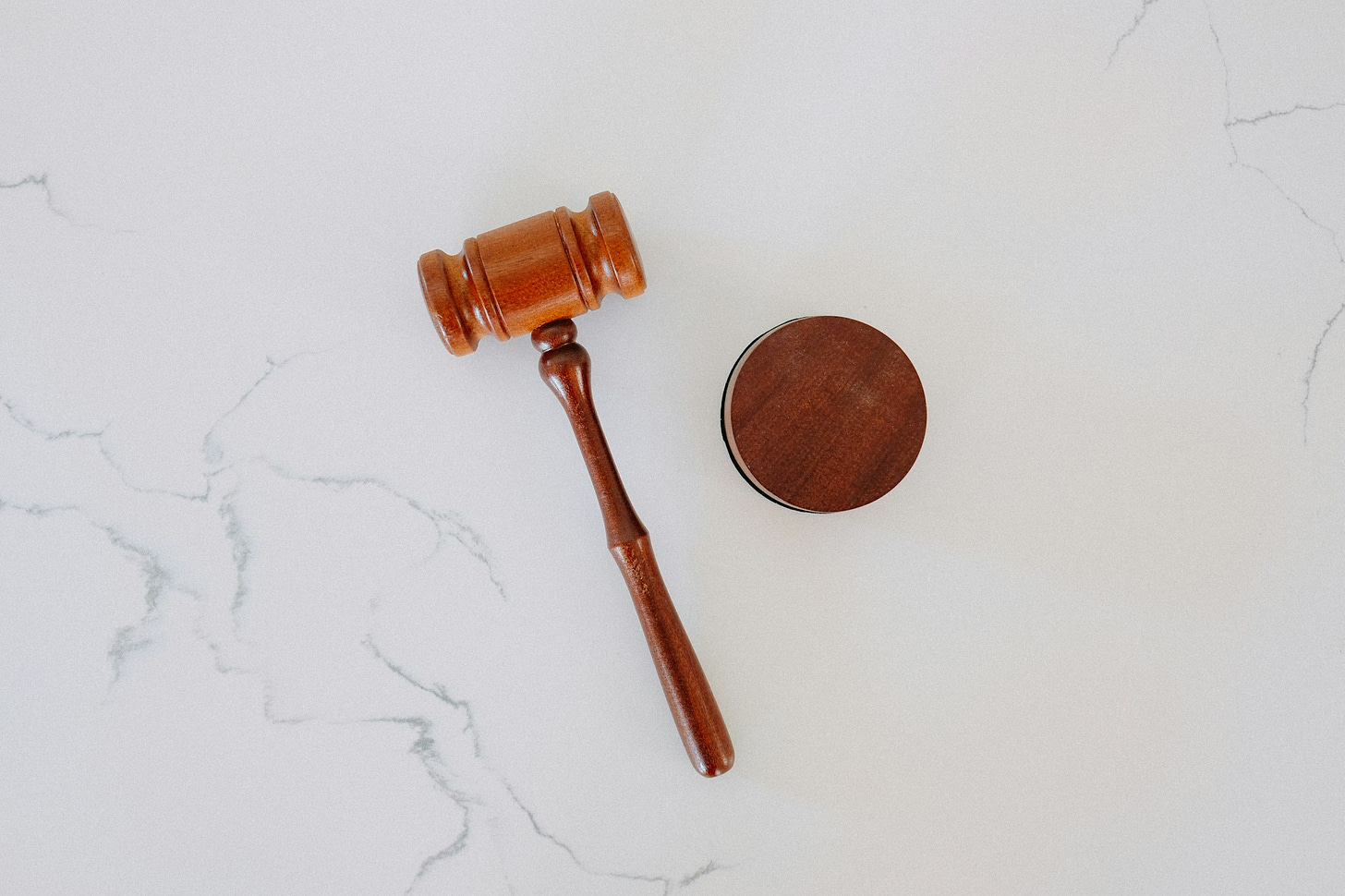 brown wooden smoking pipe on white surface brown wooden smoking pipe on white surface