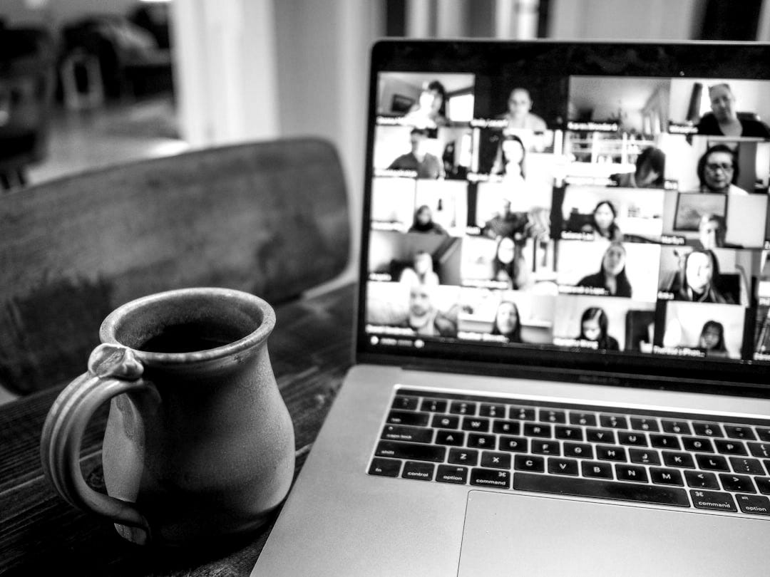 macbook pro displaying group of people macbook pro displaying group of people