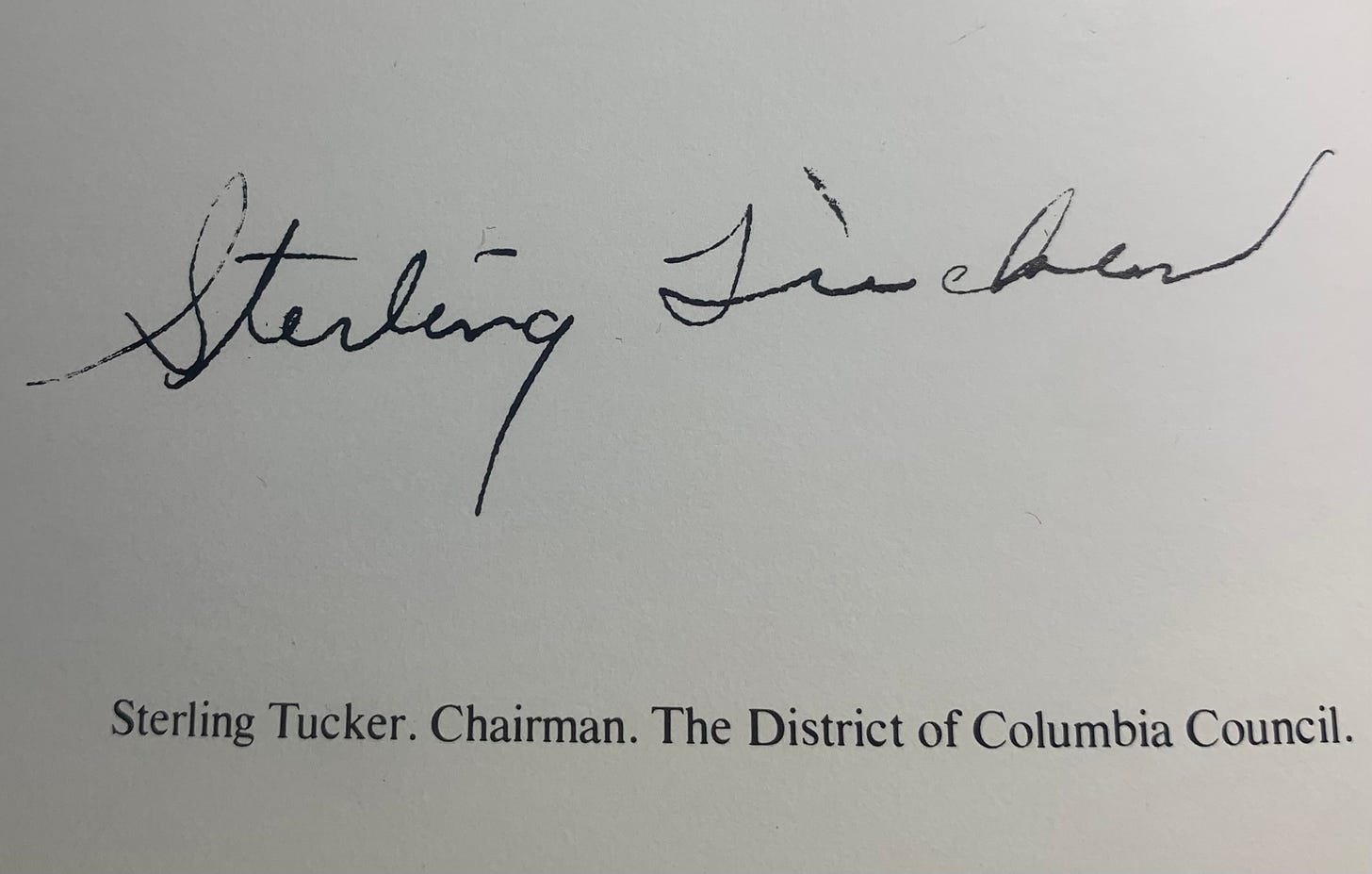 Signature of Sterling Tucker acompanied by the description "Sterling Tucker. Chairman. The District of Columbia Council.