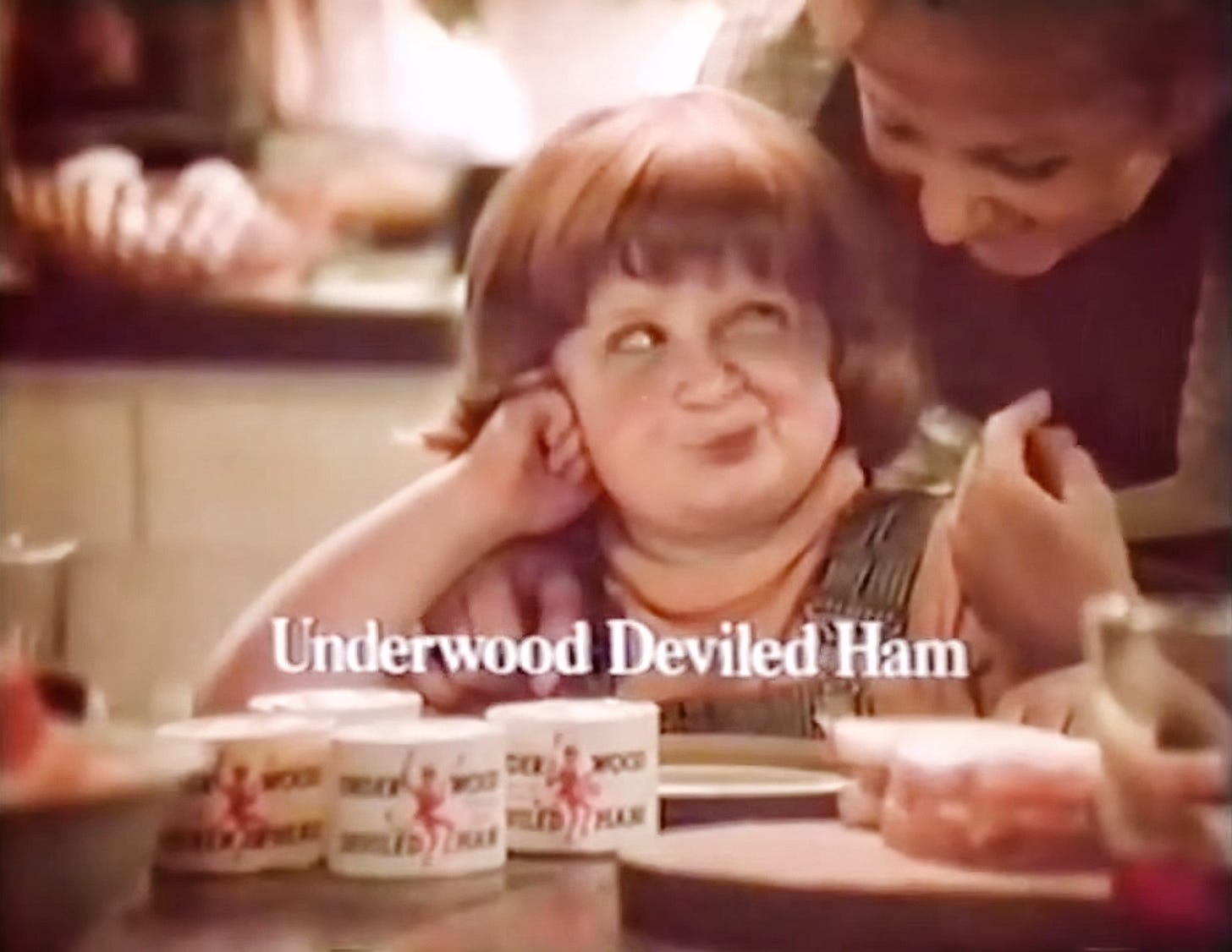 Mason Reese looking askance at his tv mom in an Underwod Deviled Ham commercial. 