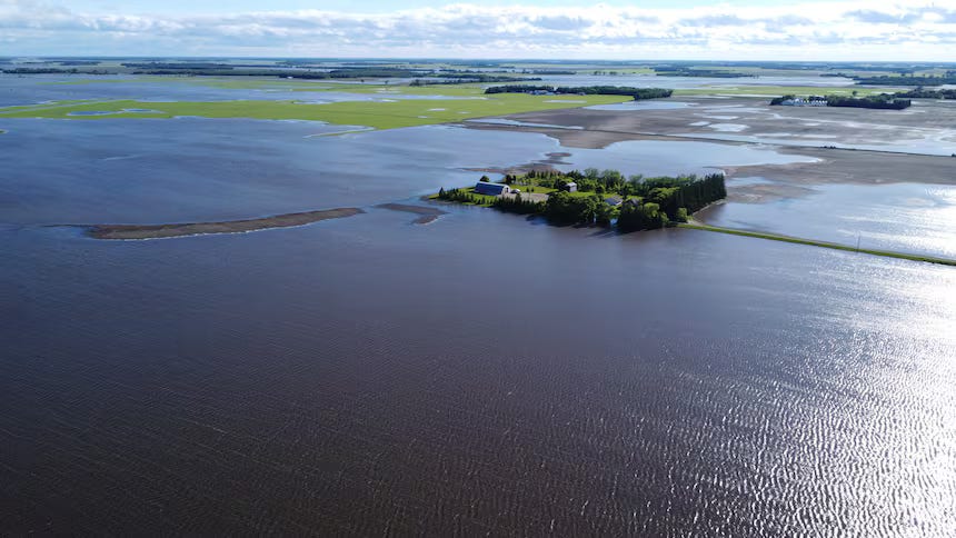 A drone shot showing the extent of the flooding caused by heavy rains around Stonewall, Canada.