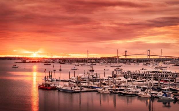 A sunset over a harbor with boats
AI-generated content may be incorrect. A sunset over a harbor with boats
AI-generated content may be incorrect.