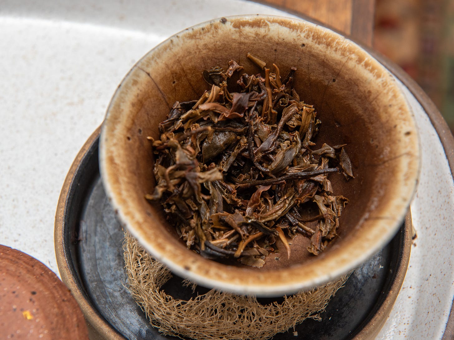 ID: Brewed Lao Man E puer tea leaves