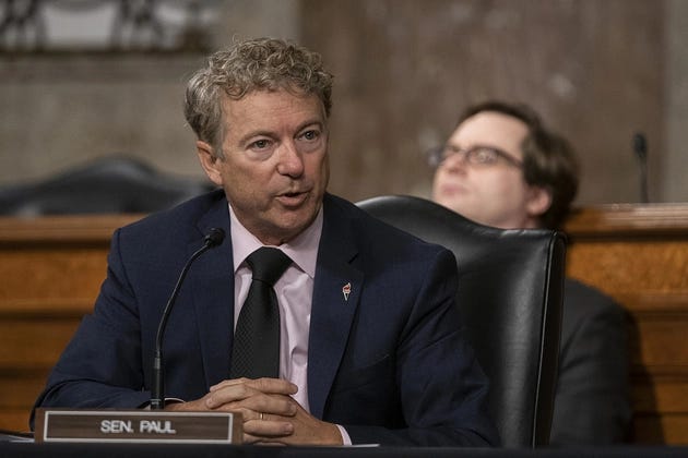 Sen. Rand Paul speaks at the dais behind his nameplate during the committee hearing. Sen. Rand Paul speaks at the dais behind his nameplate during the committee hearing.