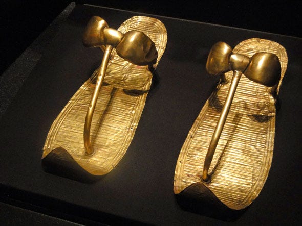 Gold slippers shod King Tut’s mummy. Gold slippers shod King Tut’s mummy.