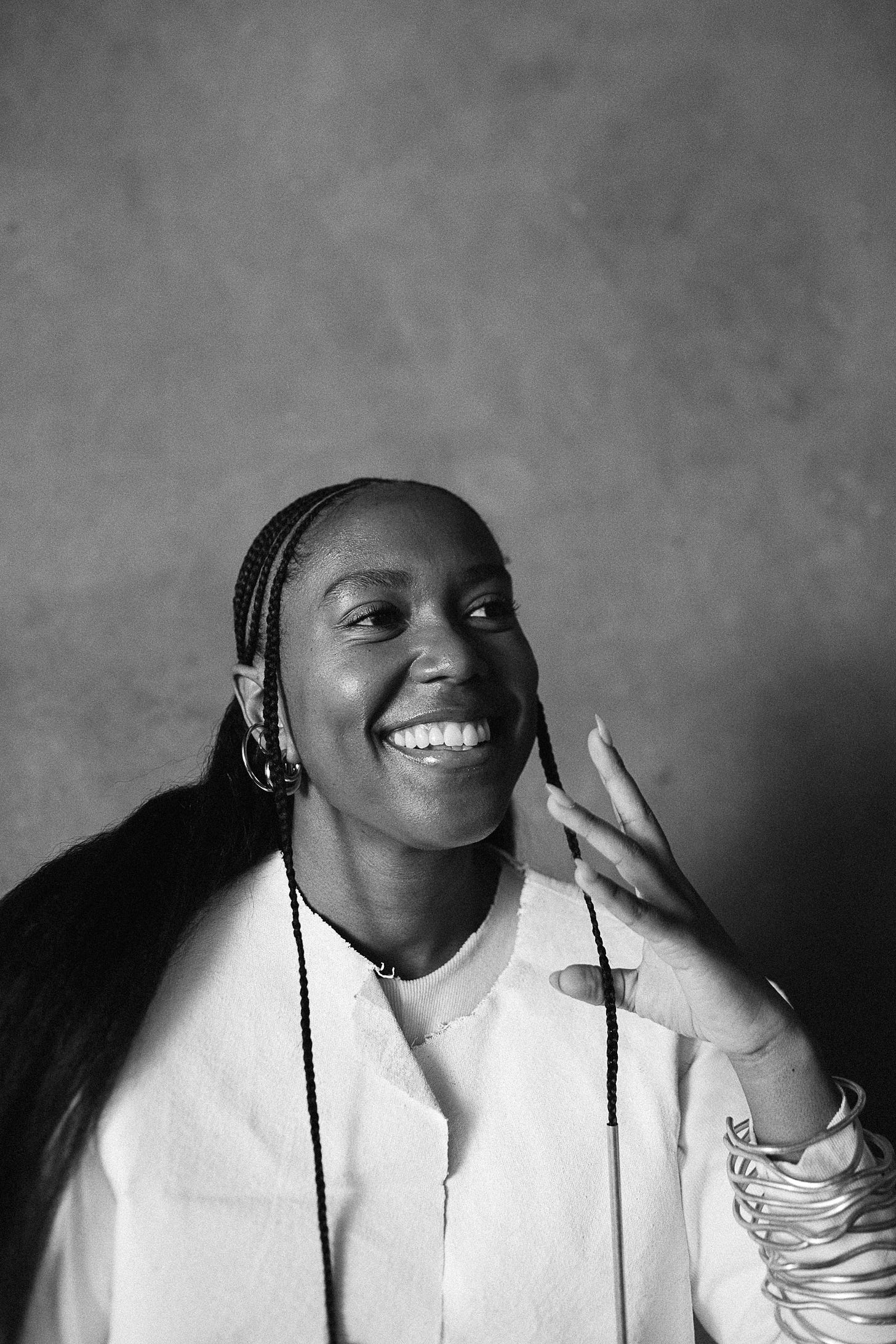 Black and white photograph of me wearing AYZACO workwear and smiling into the distance. Photographer: Stephen L.A. Miller Black and white photograph of me wearing AYZACO workwear and smiling into the distance. Photographer: Stephen L.A. Miller