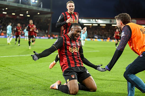 Antoine Semenyo celebrates after he scores a goal to make it 1-0 with team-mate Ryan Christie during the Premier League match between Bournemouth and...