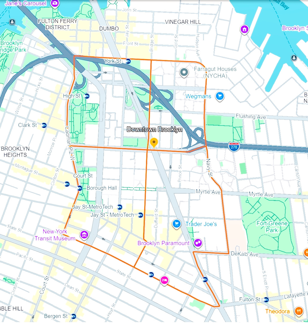 Google Map showing the Downtown Brooklyn district outlined in orange. The boundary runs north to York Street near DUMBO and Vinegar Hill, east to Navy Street and Flushing Avenue near Farragut Houses and Wegmans, south to Schermerhorn Street near 3rd Ave, and west along Cadman Plaza West and Court Street near Brooklyn Heights. Major landmarks inside the district include Borough Hall, Jay Street–MetroTech subway stations, Brooklyn Paramount, and Trader Joe’s. Elevated highways and ramps from the Brooklyn–Queens Expressway curve through the northern and eastern sections.