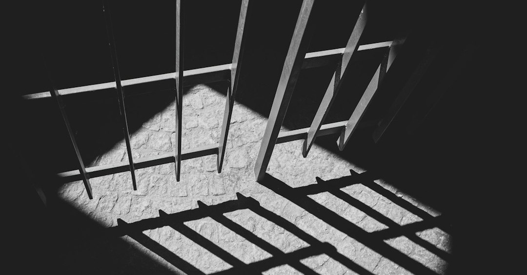 black metal frame in grayscale photography