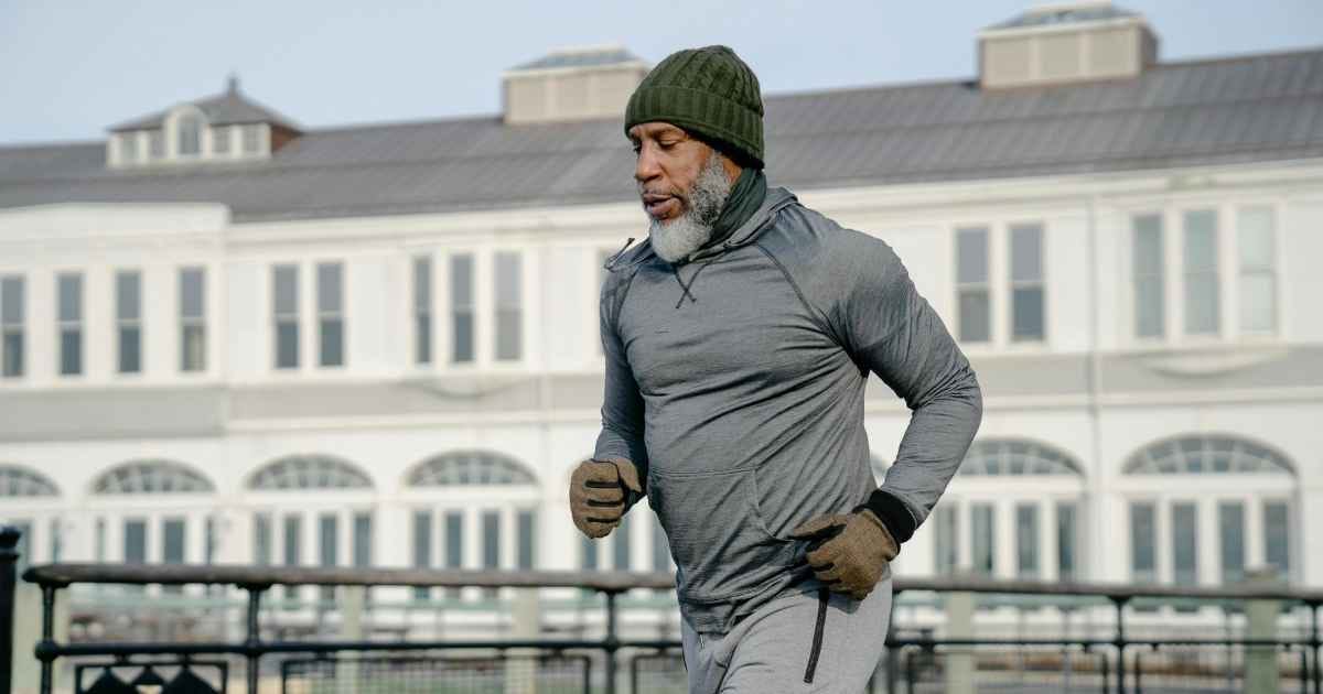 man in sportswear running on street man in sportswear running on street