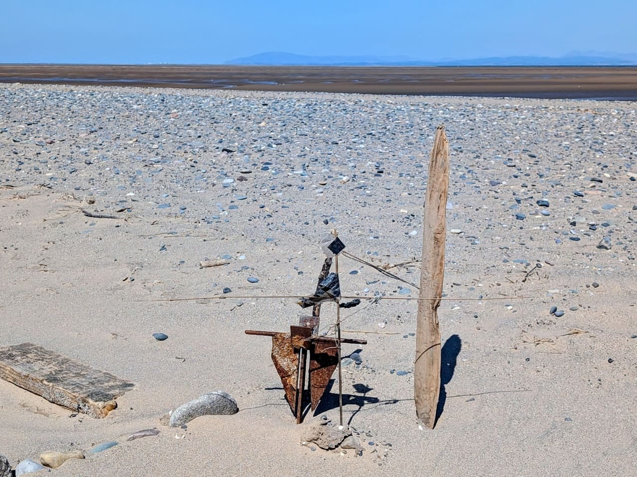 Impromptu sculpture of found objects, including an anchor and driftwood Impromptu sculpture of found objects, including an anchor and driftwood