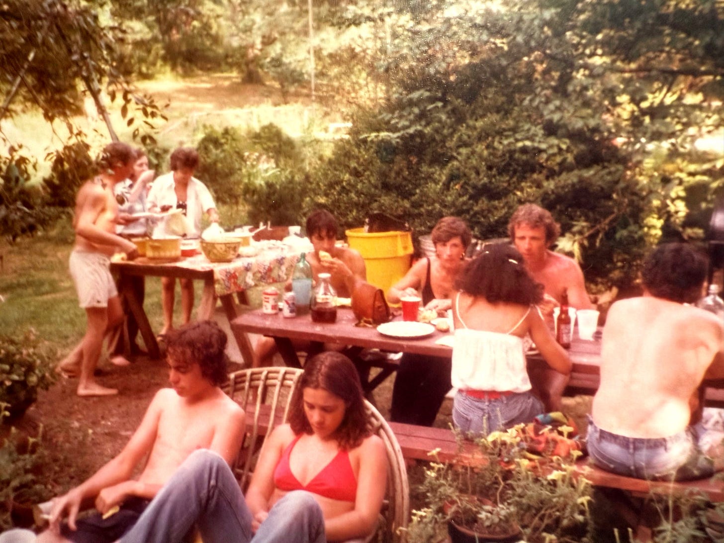 A group of people sitting at a table

AI-generated content may be incorrect.
