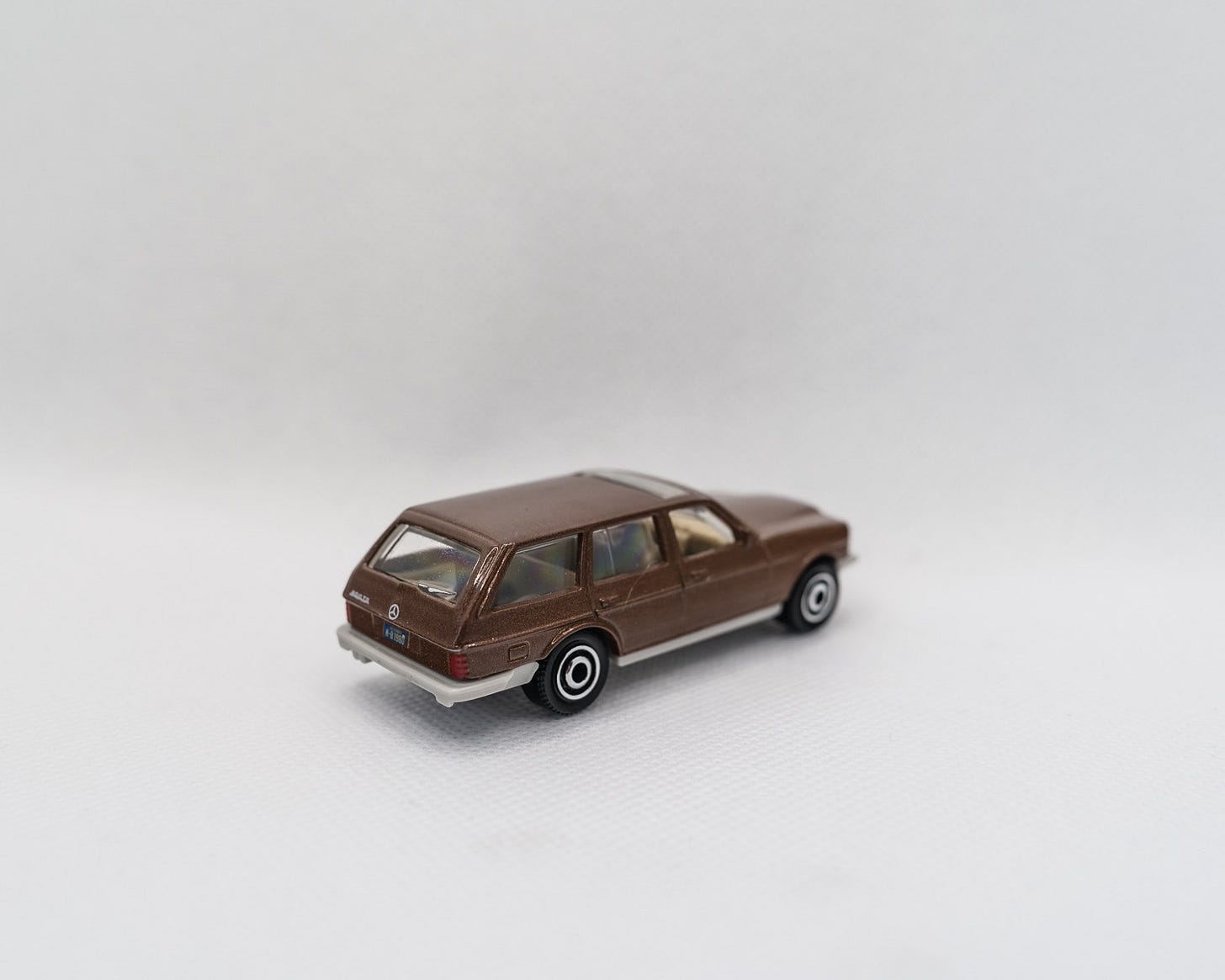 Mercedes-Benz W123 Wagon Matchbox car (Vivid Brands/shutterstock.com)