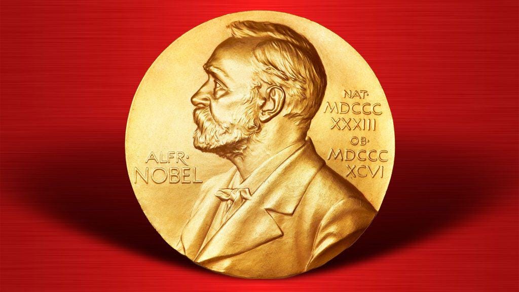 Prêmio Nobel em cima de superfície vermelha