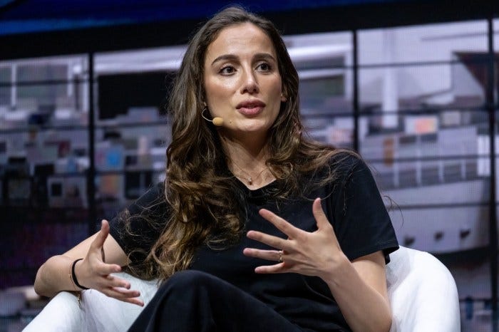Mira Murati, CEO of Thinking Machines Lab, speaking at a conference.