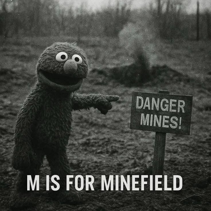 This may contain: a black and white photo of a sesame character pointing at a sign that says danger mines This may contain: a black and white photo of a sesame character pointing at a sign that says danger mines