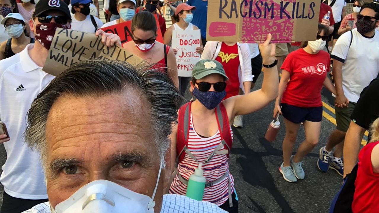 Sen. Mitt Romney participates in Floyd protest march | CNN