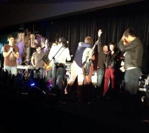 Misha hugs Rob at the one year anniversary TorCon