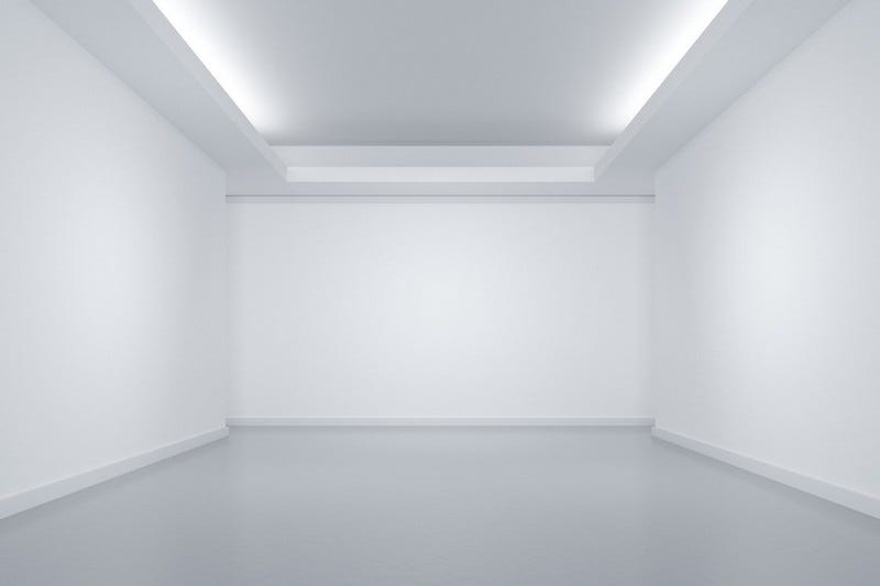 An empty white room. An empty white room.