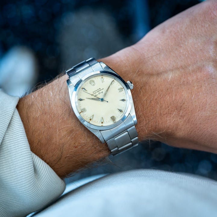 Kevin's large Cartier Paris Tank Normale and Charlie's Air-King 5504 with waffle dial